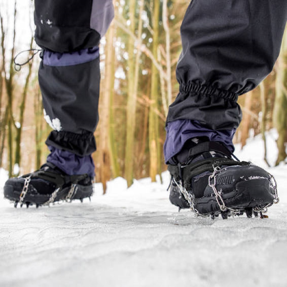 Crampons on hiking boot.Hiking in winter